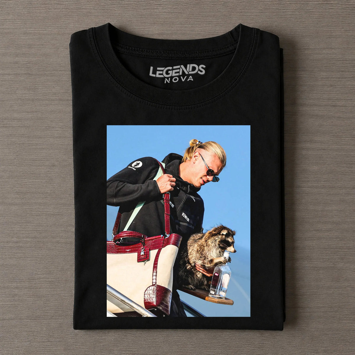 ¡°Others hold trophies after matches, I hold my raccoon¡±T-shirt