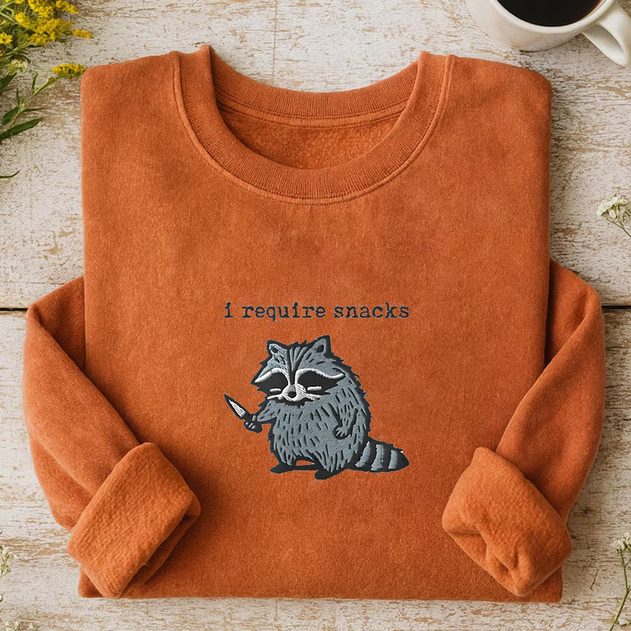 I Require Snacks Embroidered Raccoon Sweatshirt